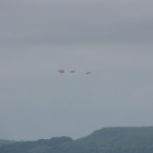 Red arrows fly by